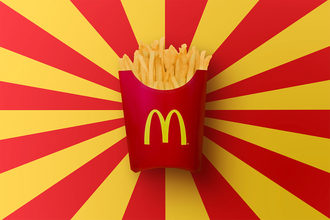 McDonald's french fries on a red and yellow background